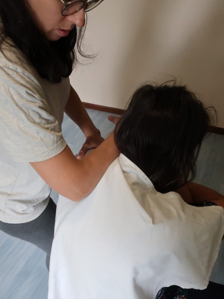 massage assis épaule